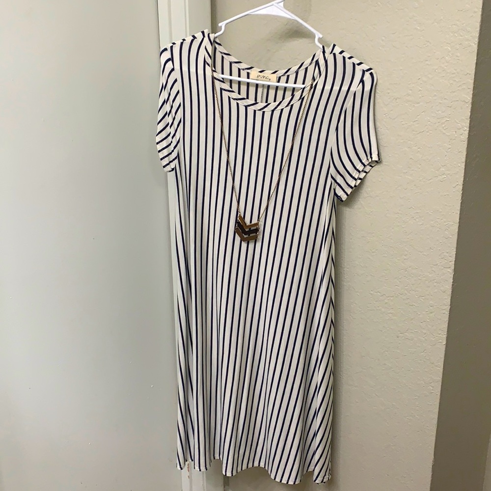 Never used, loose dress, knee length